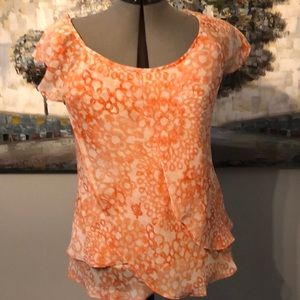 Blouse White background with tangerine floral print